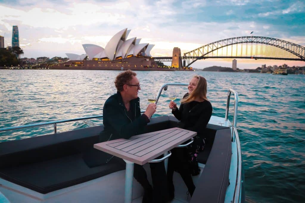 boat in front of opera house