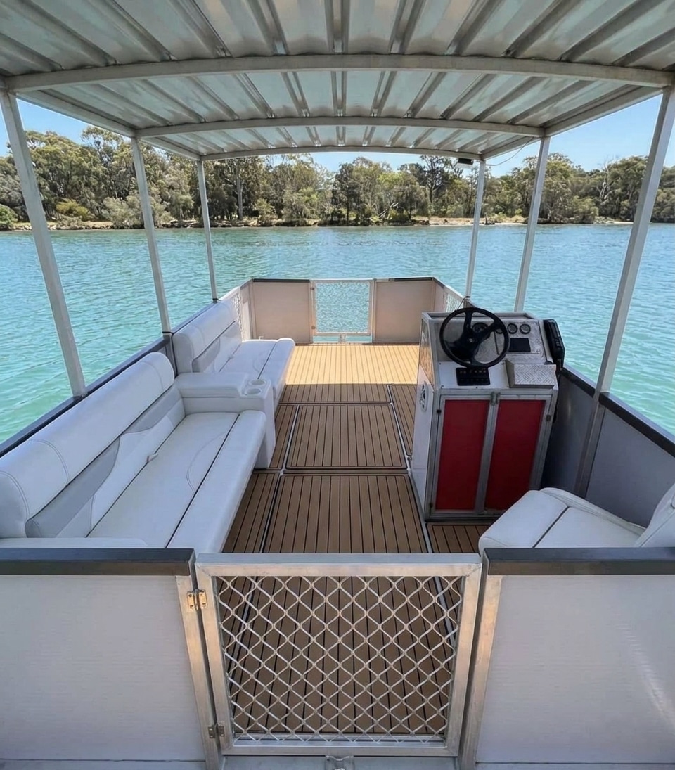 Open shaded deck and seating on Frankie BBQ pontoon