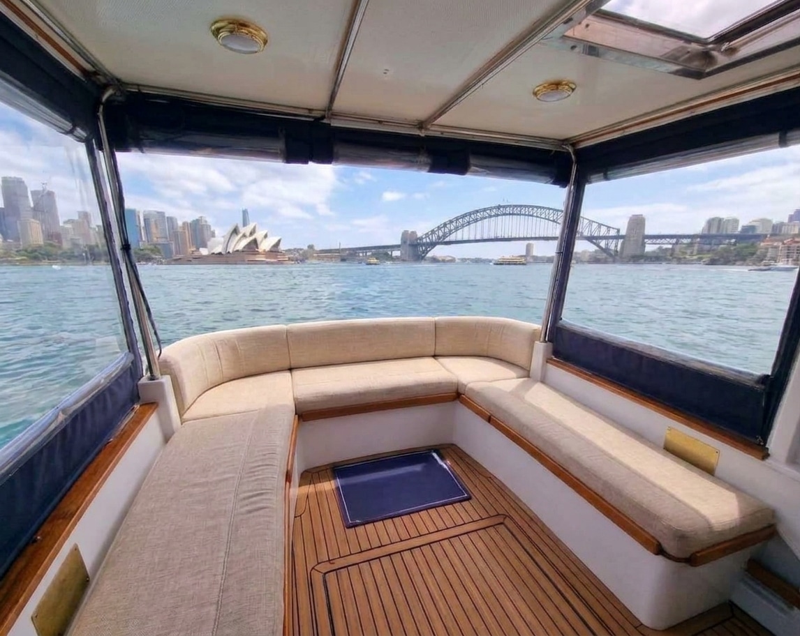 Shaded aft deck with wraparound seating on Marlow